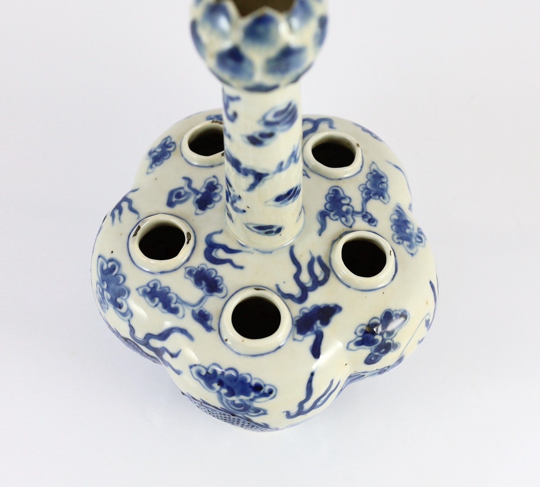 A Chinese blue and white ’dragon’ tulip vase, 19th century, 25cm high, splinter chips